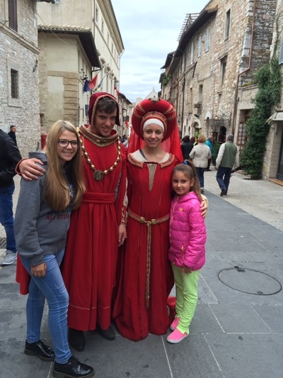 Spiritual Meditation & Mindfulness Retreats in Assisi, Italy, Europe people in street photo 2